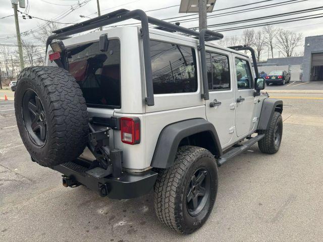 used 2012 Jeep Wrangler Unlimited car, priced at $13,499