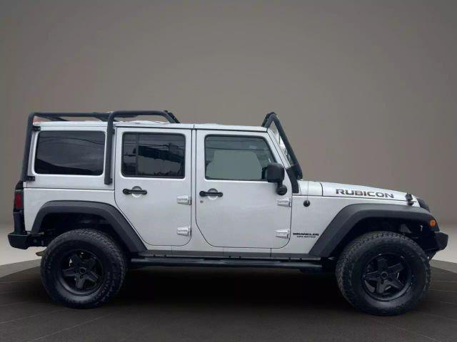used 2012 Jeep Wrangler Unlimited car, priced at $12,399