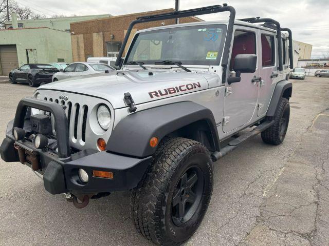 used 2012 Jeep Wrangler Unlimited car, priced at $13,499