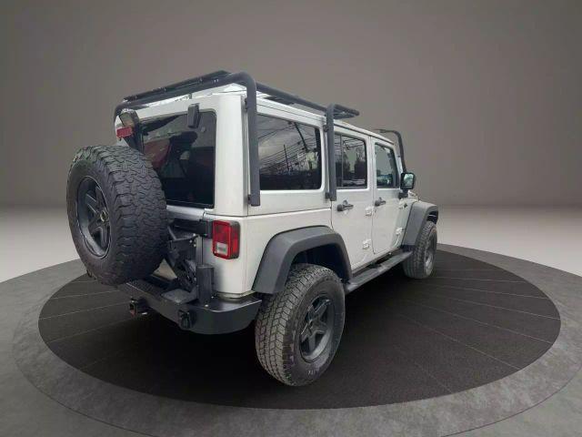 used 2012 Jeep Wrangler Unlimited car, priced at $12,399