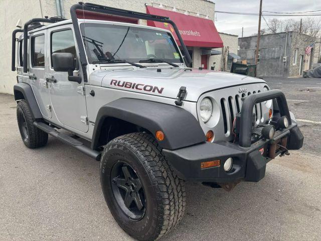 used 2012 Jeep Wrangler Unlimited car, priced at $13,499