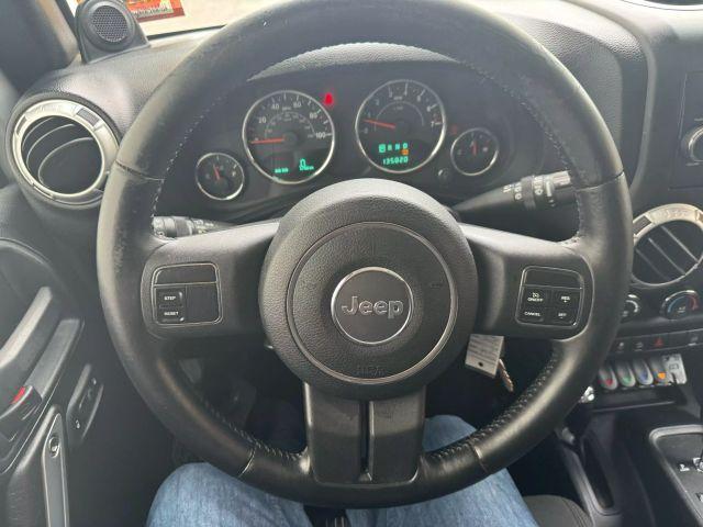 used 2012 Jeep Wrangler Unlimited car, priced at $13,499