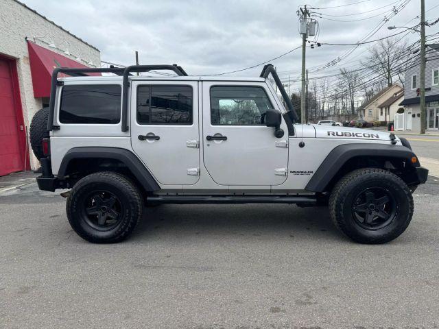 used 2012 Jeep Wrangler Unlimited car, priced at $13,499
