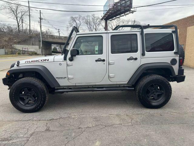 used 2012 Jeep Wrangler Unlimited car, priced at $13,499