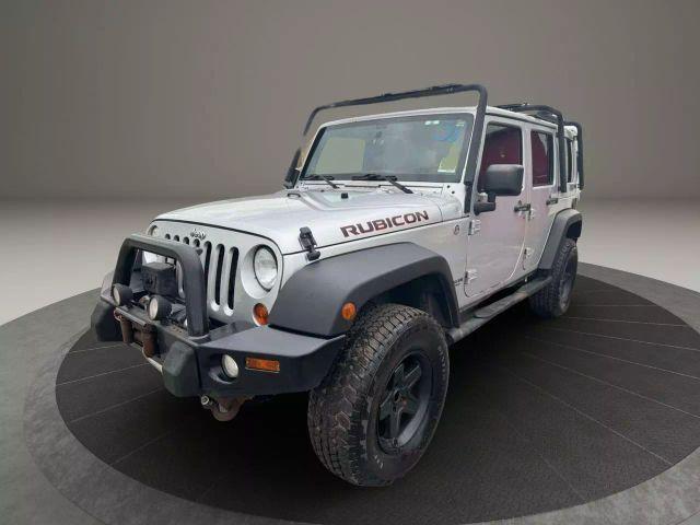 used 2012 Jeep Wrangler Unlimited car, priced at $12,399