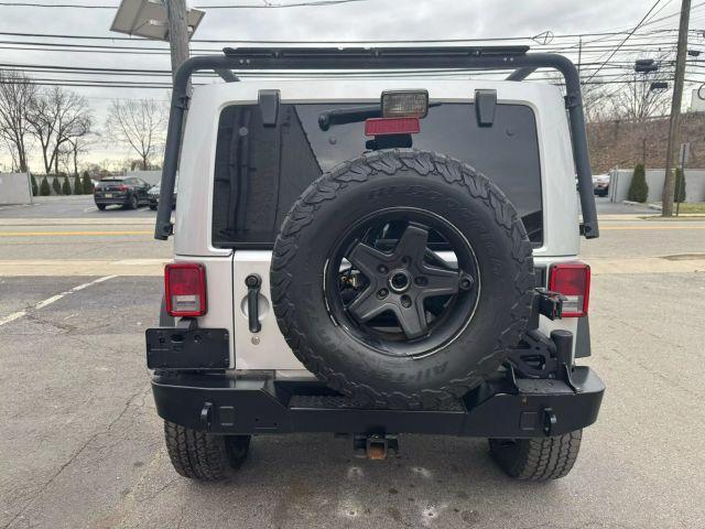 used 2012 Jeep Wrangler Unlimited car, priced at $13,499