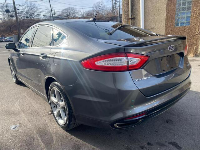 used 2015 Ford Fusion car, priced at $8,699