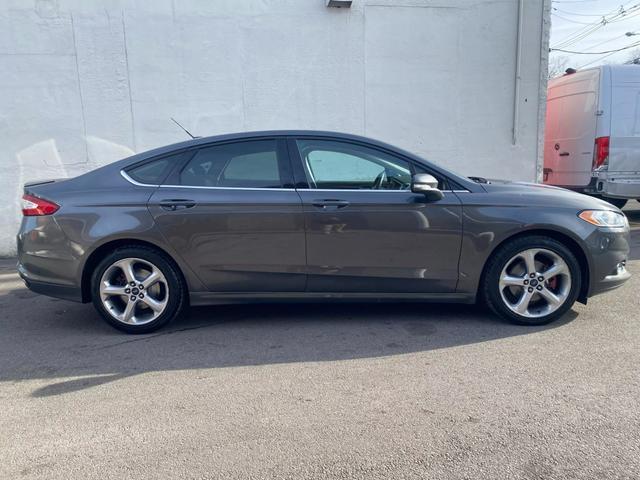 used 2015 Ford Fusion car, priced at $8,699