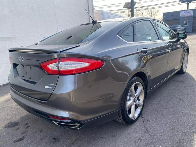 used 2015 Ford Fusion car, priced at $8,699