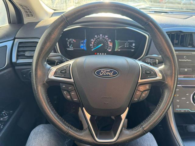 used 2015 Ford Fusion car, priced at $8,799