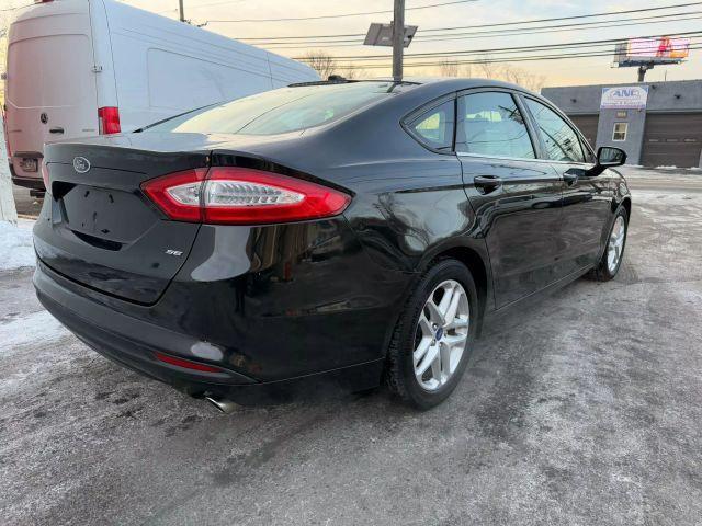 used 2013 Ford Fusion car, priced at $5,499