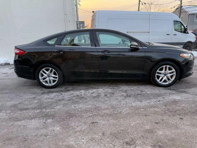 used 2013 Ford Fusion car, priced at $6,499