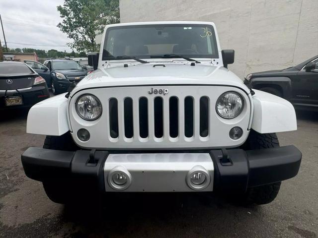 used 2015 Jeep Wrangler Unlimited car, priced at $15,599