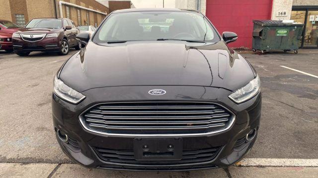 used 2014 Ford Fusion car, priced at $9,999