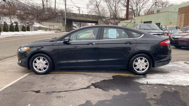 used 2014 Ford Fusion car, priced at $9,999