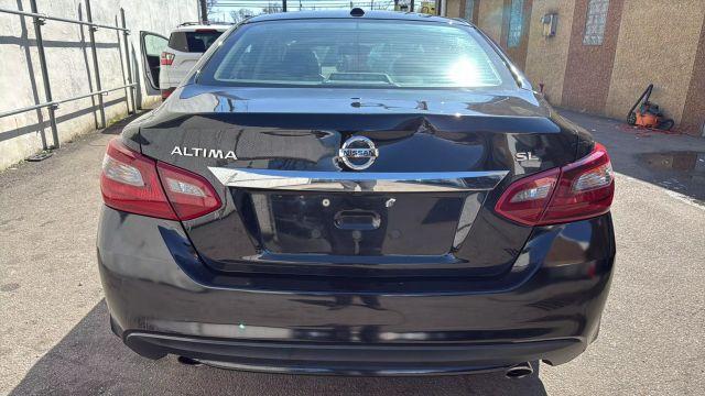 used 2018 Nissan Altima car, priced at $9,999