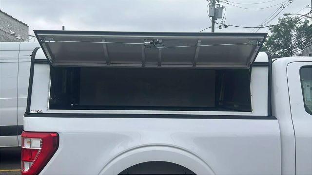 used 2021 Ford F-150 car, priced at $14,999