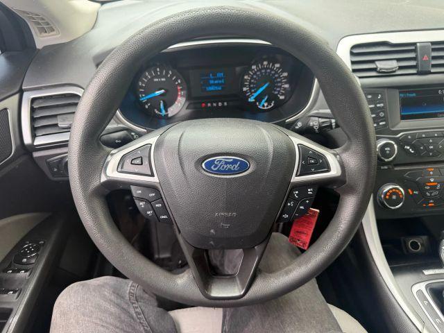 used 2015 Ford Fusion car, priced at $6,999