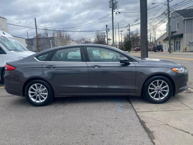 used 2017 Ford Fusion car, priced at $7,999