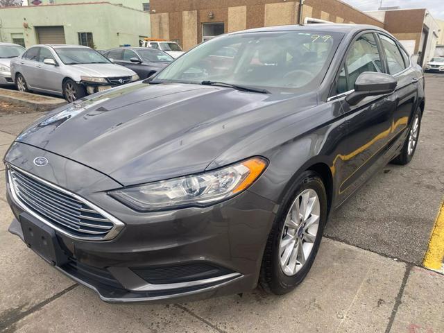 used 2017 Ford Fusion car, priced at $7,999