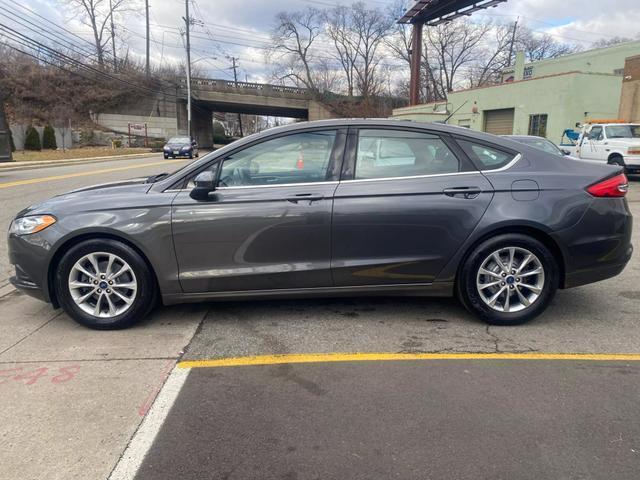 used 2017 Ford Fusion car, priced at $7,999