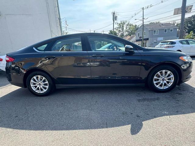 used 2015 Ford Fusion car, priced at $11,799