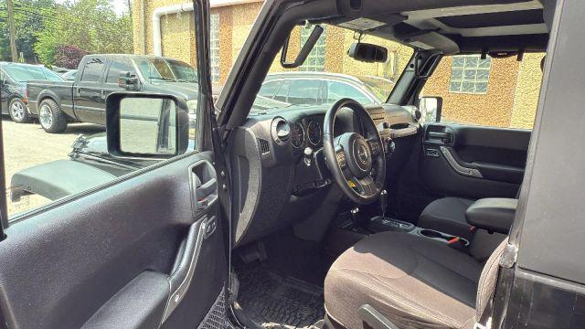used 2015 Jeep Wrangler car, priced at $15,499