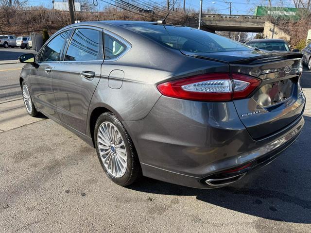 used 2015 Ford Fusion car, priced at $13,699