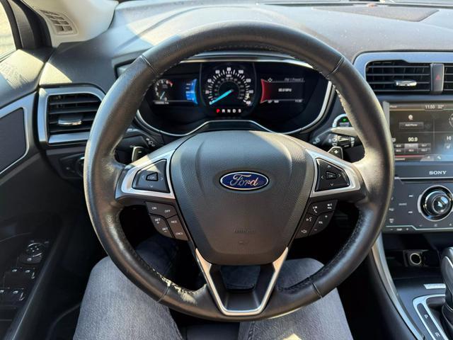 used 2015 Ford Fusion car, priced at $12,999