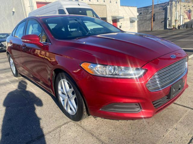 used 2016 Ford Fusion car, priced at $7,999