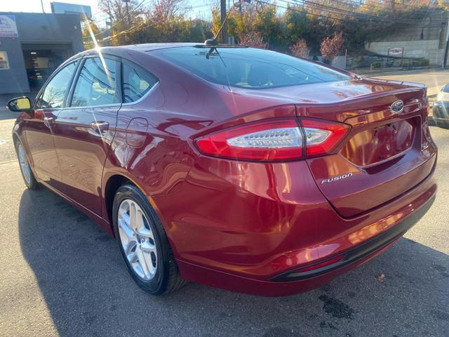 used 2016 Ford Fusion car, priced at $7,999