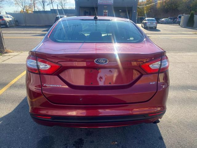 used 2016 Ford Fusion car, priced at $7,999