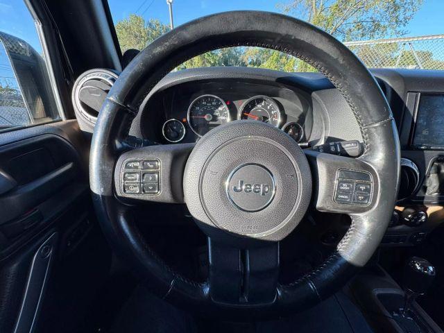 used 2012 Jeep Wrangler Unlimited car, priced at $10,799