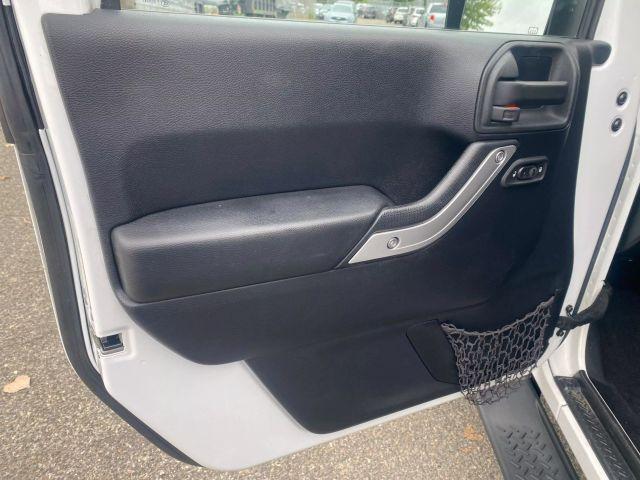 used 2015 Jeep Wrangler car, priced at $13,299