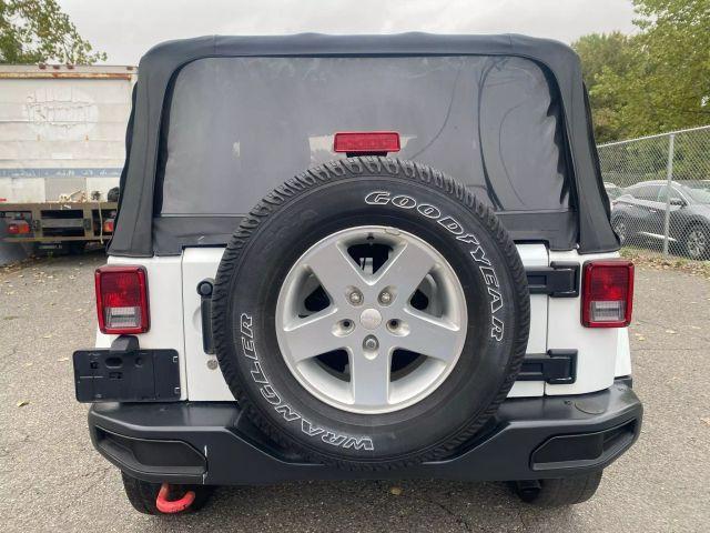 used 2015 Jeep Wrangler car, priced at $13,299
