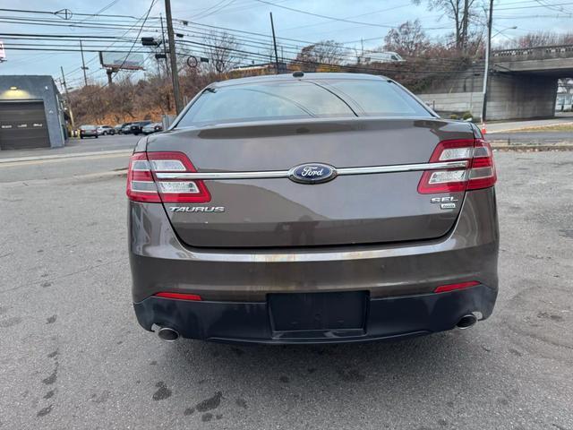 used 2015 Ford Taurus car, priced at $8,999