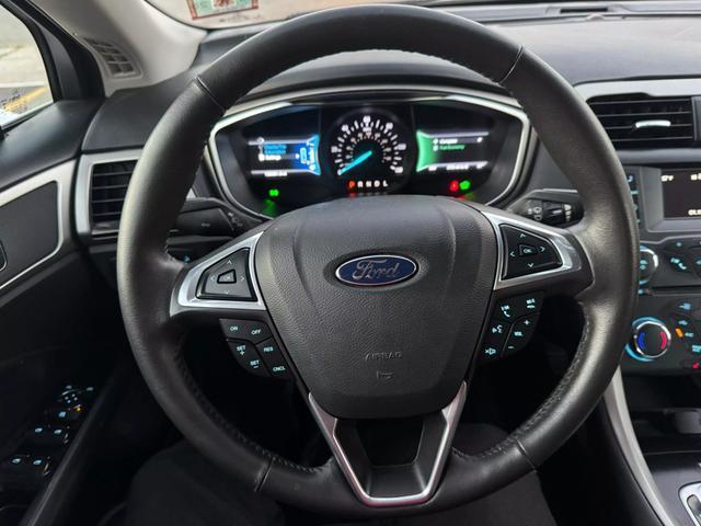 used 2015 Ford Fusion Hybrid car, priced at $6,999