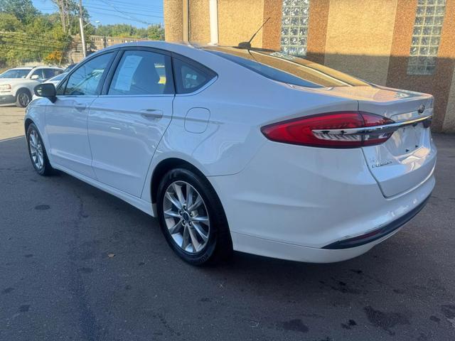 used 2017 Ford Fusion car, priced at $7,499