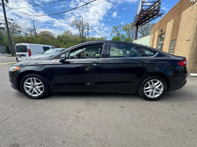 used 2016 Ford Fusion car, priced at $6,799