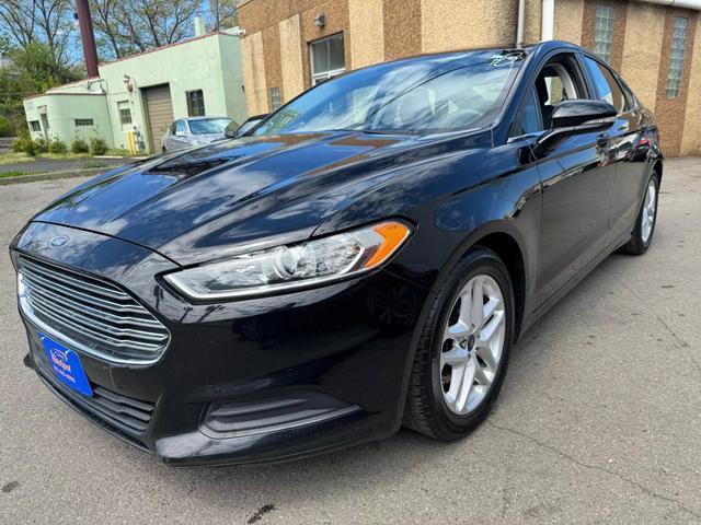 used 2016 Ford Fusion car, priced at $6,999