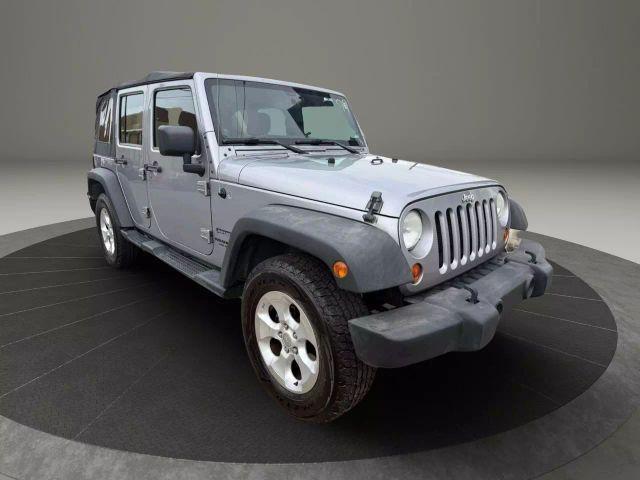 used 2013 Jeep Wrangler Unlimited car, priced at $11,499
