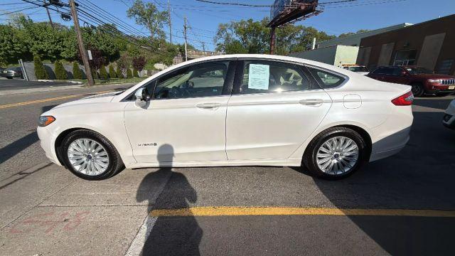 used 2015 Ford Fusion Hybrid car, priced at $7,499