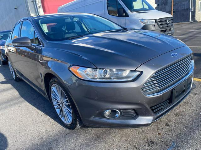 used 2014 Ford Fusion car, priced at $5,999