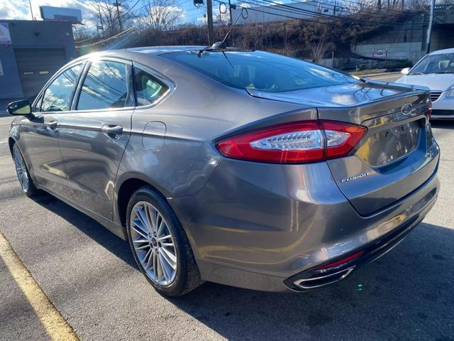 used 2014 Ford Fusion car, priced at $5,999