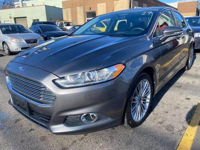 used 2014 Ford Fusion car, priced at $5,499