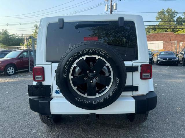 used 2012 Jeep Wrangler Unlimited car, priced at $14,599