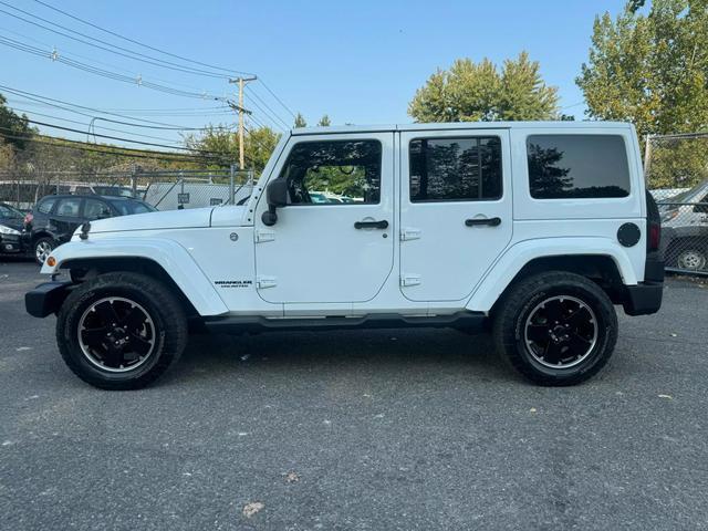 used 2012 Jeep Wrangler Unlimited car, priced at $14,599