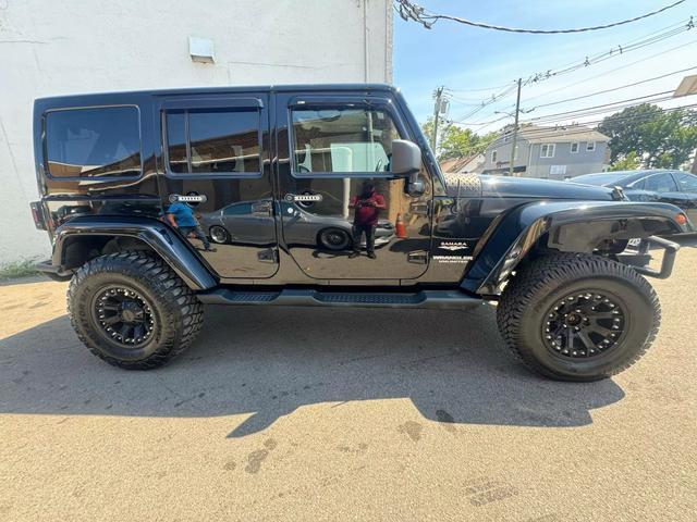 used 2013 Jeep Wrangler Unlimited car, priced at $13,999