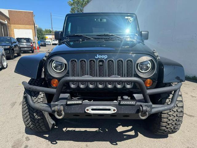 used 2013 Jeep Wrangler Unlimited car, priced at $13,999