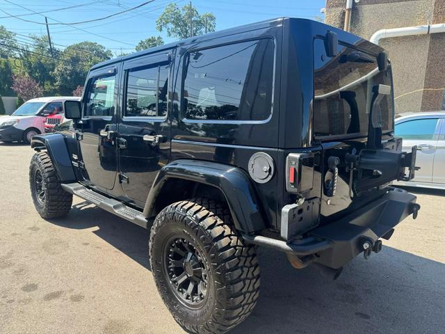 used 2013 Jeep Wrangler Unlimited car, priced at $13,999